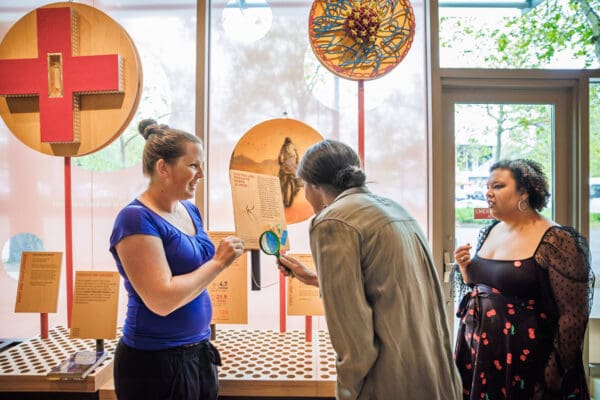 visitors poke around at the Discovery Center