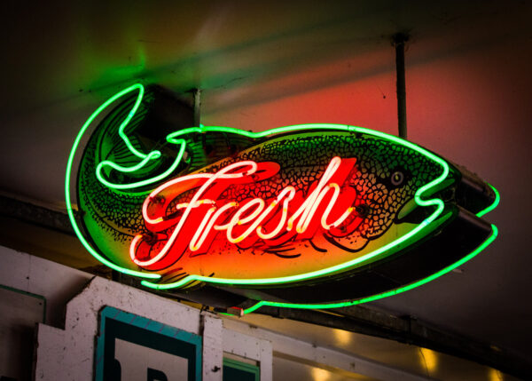 Neon sign for fresh fish at Pike Place Market